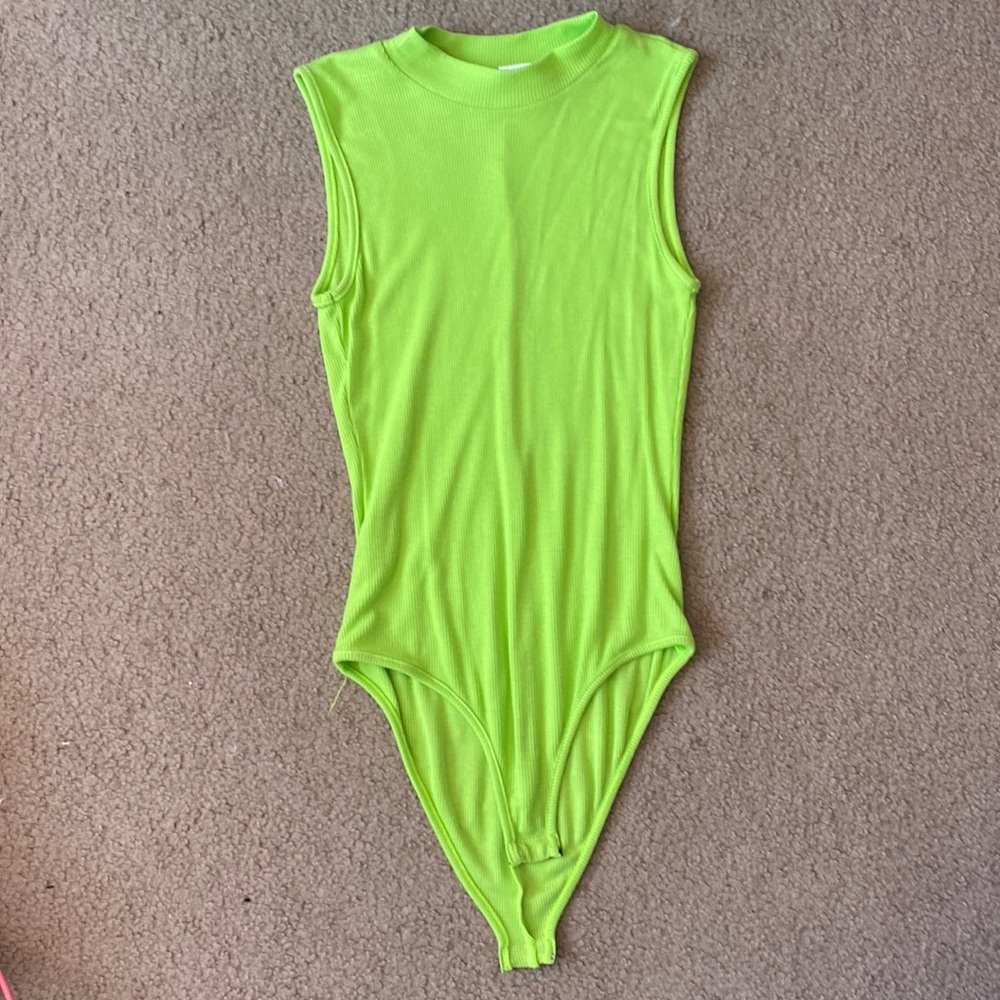 Neon green, tight-fit, bodysuit.